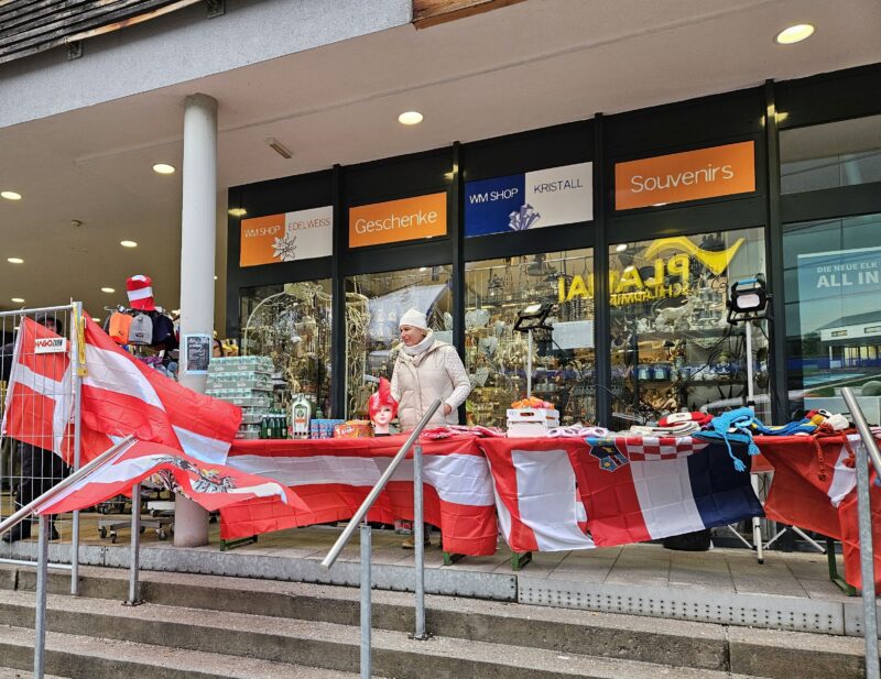 Merchandise on sale outside the stadium at the Schladming night race 2024. Image © PlanetSKI