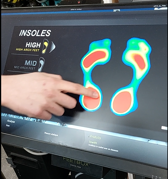 Boot fitting at Intersport. Image © Iain Martin