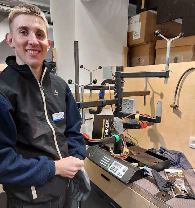 Pierre, boot fitter at Intersport. Image © Iain Martin